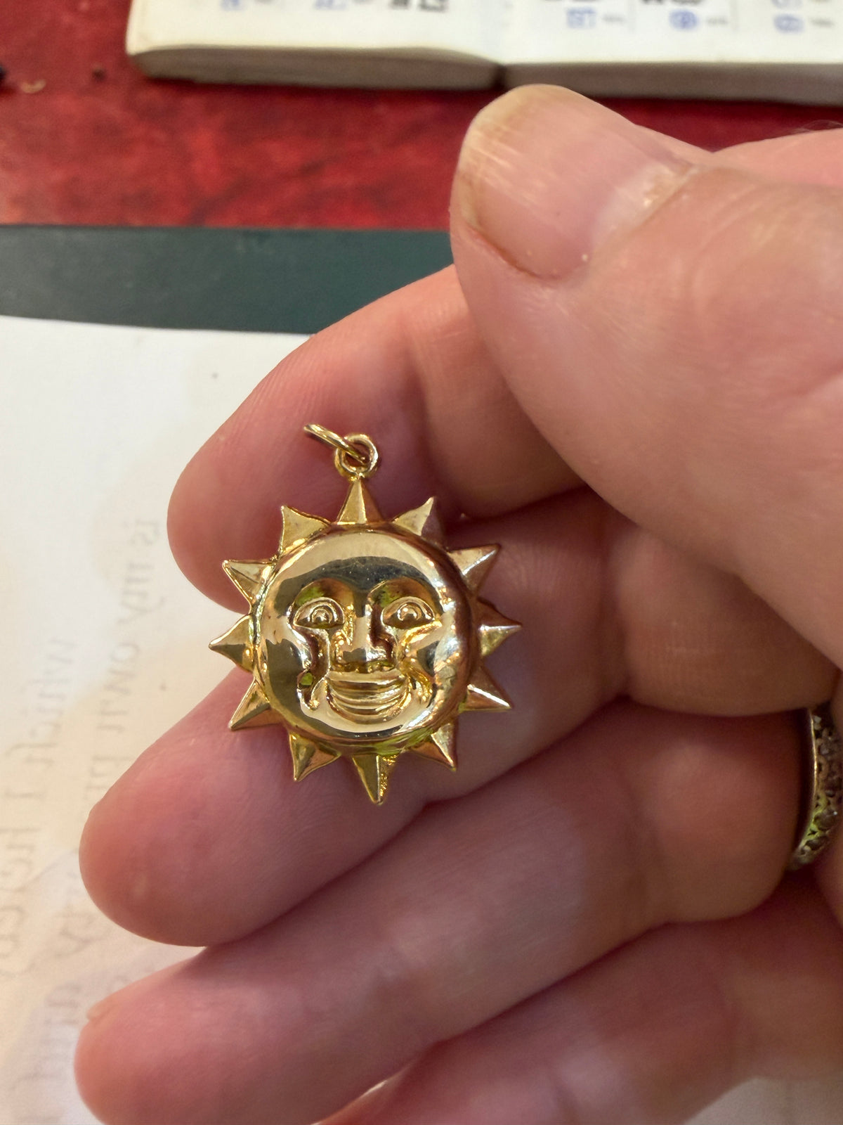 9ct vintage sun charm circa 1976.1.3g HOLLOW.
