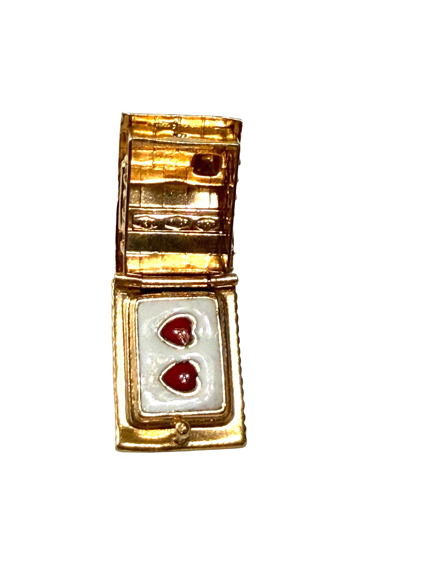 18ct vintage swiss chalet charm with two hearts inside.