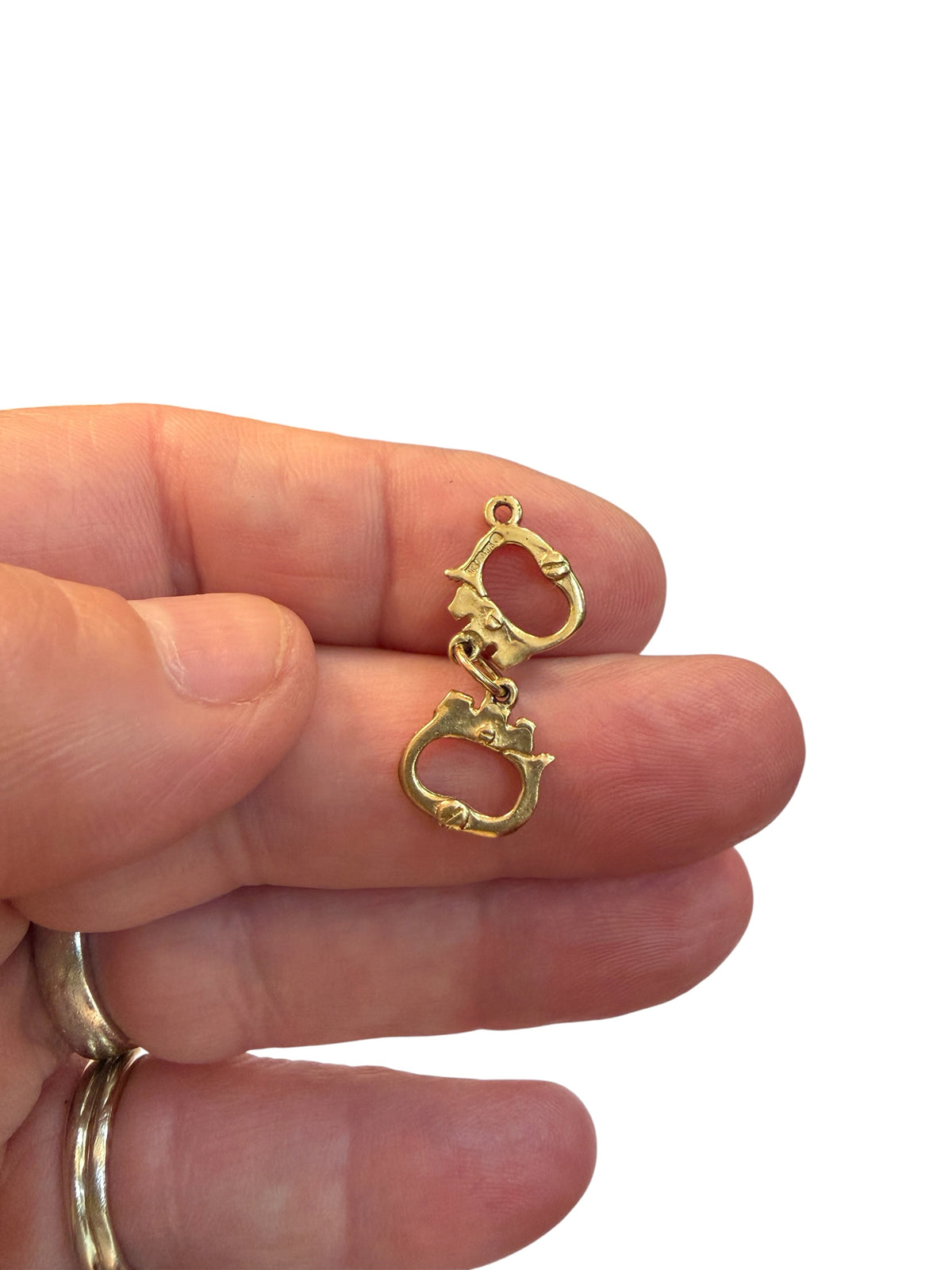 9ct vintage handcuff charm / pendant . 1.2g