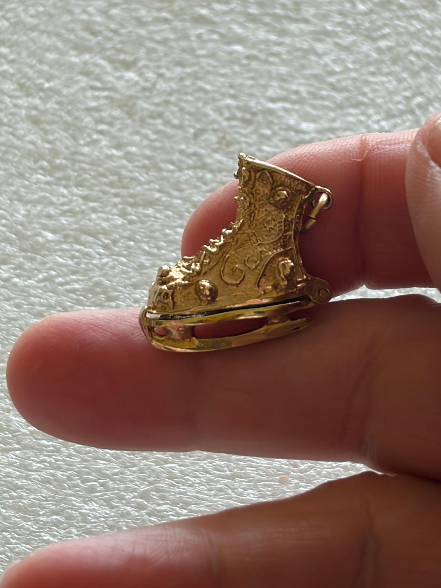 9ct vintage ice skate charm circa 1966 London with enamel skater inside. 6.2g